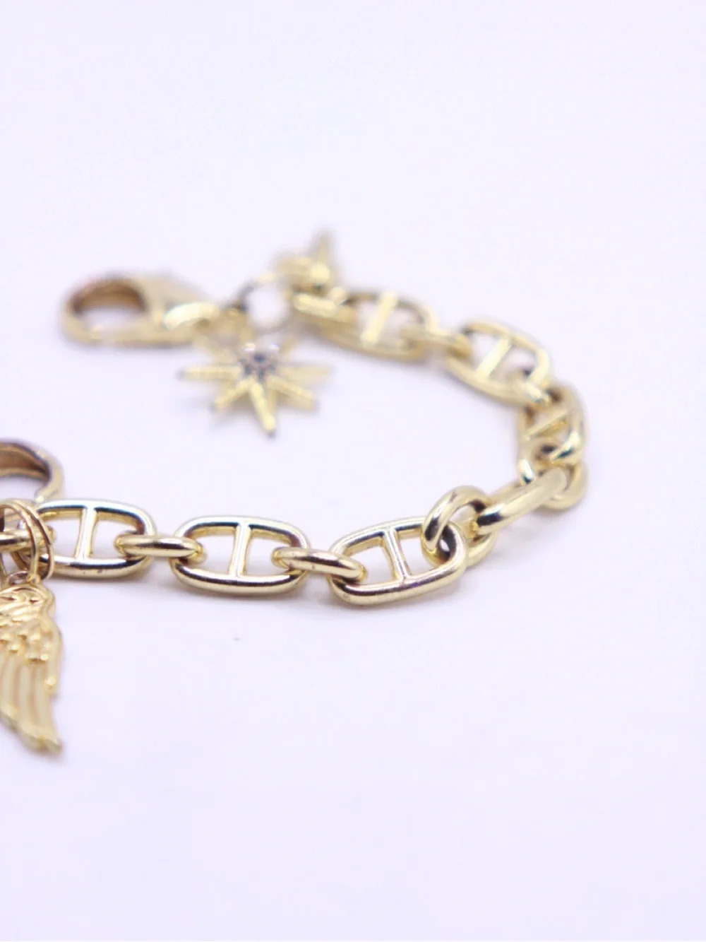 Bandolier Gold-Tone Charm Wristlet Bracelet with Star, Wing & Disc Charms - Picture 3 of 5